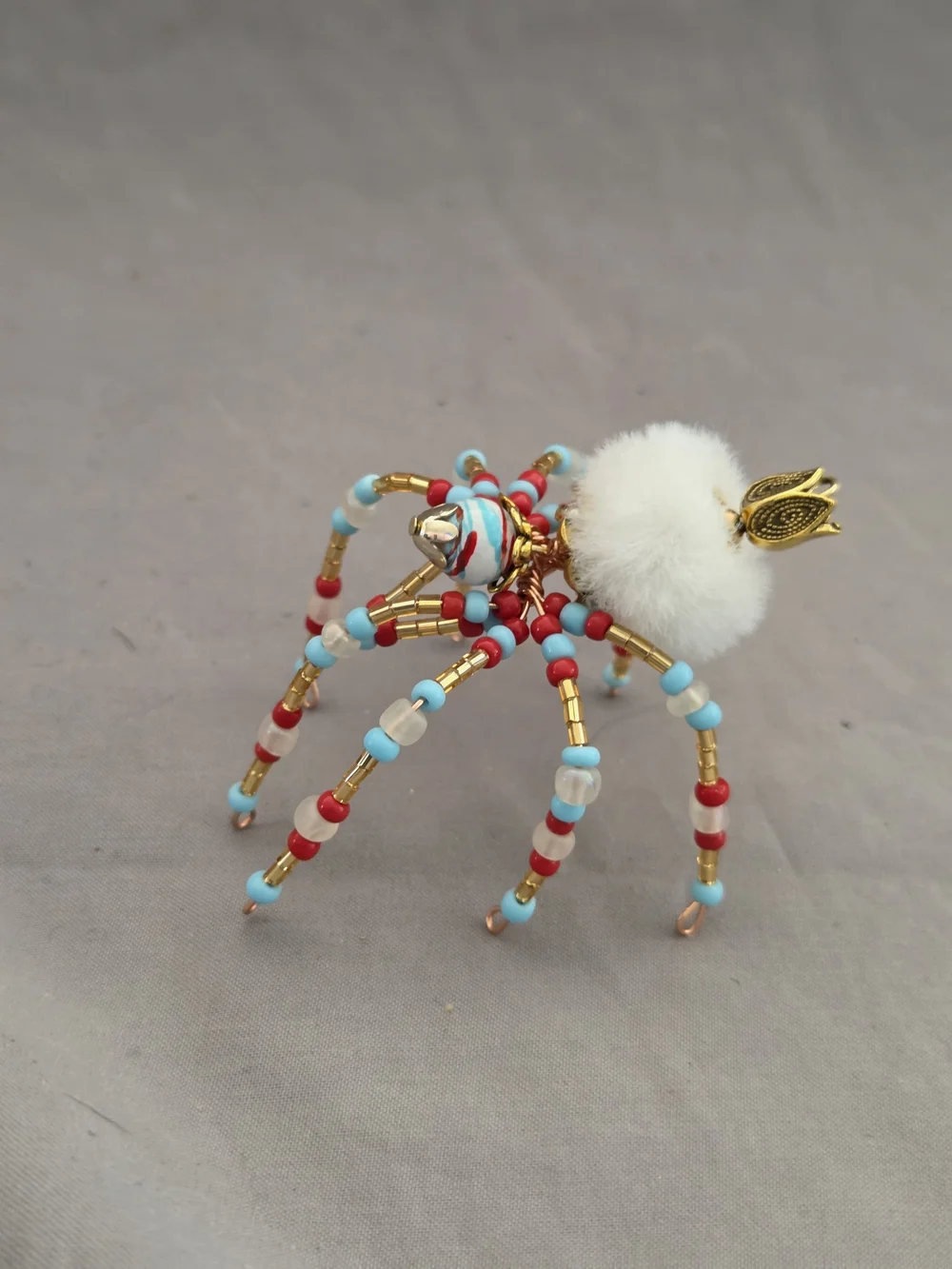 Beaded Spide with White Fur Accent